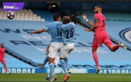 Penyerang Real Madrid, Karim Benzema cetak gol lewat heading ke gawang Manchester City. FOTO : NET