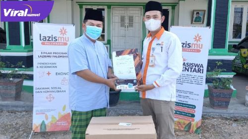 Ahmad Zarkasih, SHI., MM, Ketua PW GP Ansor Sumsel menyalurkan bantuan 4.000 masker melalui Lazismu Muhammadiyah Palembang. FOTO : VIRALSUMSEL.COM