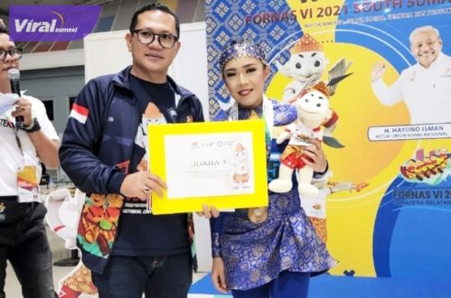Ketua FOKBI Sumsel Firdaus Hasbullah bersama Fernika Nini di Dinning Hall, Jakabaring, 2 Juli 2022. Foto : viralsumsel.com/ion