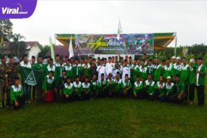 Ahmad Zarkasih (tengah) Ketua PW GP Ansor Sumsel Ketik Menghadiri Apel Akbar di Desa Tirto Sari Kecamatan Banyuasin I, Foto : Viralsumsel/Noto