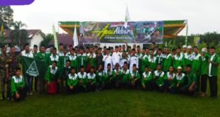 Ahmad Zarkasih (tengah) Ketua PW GP Ansor Sumsel Ketik Menghadiri Apel Akbar di Desa Tirto Sari Kecamatan Banyuasin I, Foto : Viralsumsel/Noto