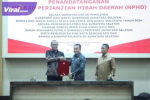 Pemerintah Provinsi, Kabupaten dan Kota Se-Sumsel Serentak Tandatangani NPHD Dana Pilkada. Foto : viralsumsel.com/win