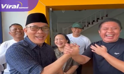 Heri Amalindo dan Herman Deru Saat Salam Komando di Kantor DPW Nasdem Sumsel. Foto : Viralsumsel/Nto