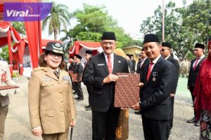 Irup HUT UU Peraturan Dasar Pokok-pokok Agraria, Sekda Provinsi Sumsel Edward Candra Bacakan  Pidato Menteri ATR/BPN RI. Foto : viralsumsel.com /win