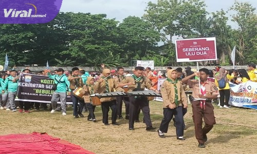 Para Kontingen Pekan Olahraga Palembang Ke-XI Kecamatan Seberang Ulu Dua Saat Melakukan Parade di Stadion Kamboja Palembang. Foto : Viralsumsel/Nto