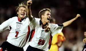 Michael-Owen-celebrates-scoring-for-England-against-Romania-at-the-1998-FIFA-World-Cup Pencetak Gol Termuda dalam Sejarah Piala Dunia: Dari Pele hingga Jude Bellingham, Deretan Wonderkid yang Mengukir Rekor Dunia