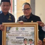 PT Tirta Sriwijaya Maju Salurkan Bantuan Paving Block untuk Kantor Desa Talang Buluh
