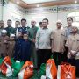 Di Sela Penanganan Karhutla, Herman Deru dan Menko Polkam Santuni Anak Yatim di Palembang